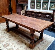 A 19th century English oak Refectory dining table, cup and cover legs, central refectory H