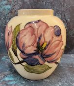 A Moorcroft Magnolia pattern ovoid vase, 19cm, signed, puce paper label to the late Queen Mary c.