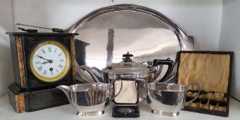 A 19th century Belge Noir mantel clock, Elkington four piece tea service; a white medal by Vaughtons