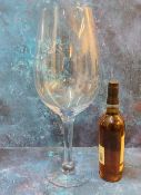 An unusual oversized wine glass, possibly an advertising shop display or bar window model, 51cm high