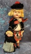 A Roddy hard plastic walking doll, in Scottish dress, 30cm high, c.1950;  a Rosebud costume doll,