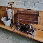 A Kildare sewing machine, cased;   an oak smoker's stand, 63cm high, c.1930;   a galvanised water