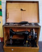 A Singer sewing machine, cased