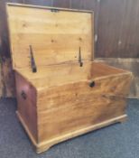 An early 20th century rectangular pine blanket box, 46cm high, 84cm wide