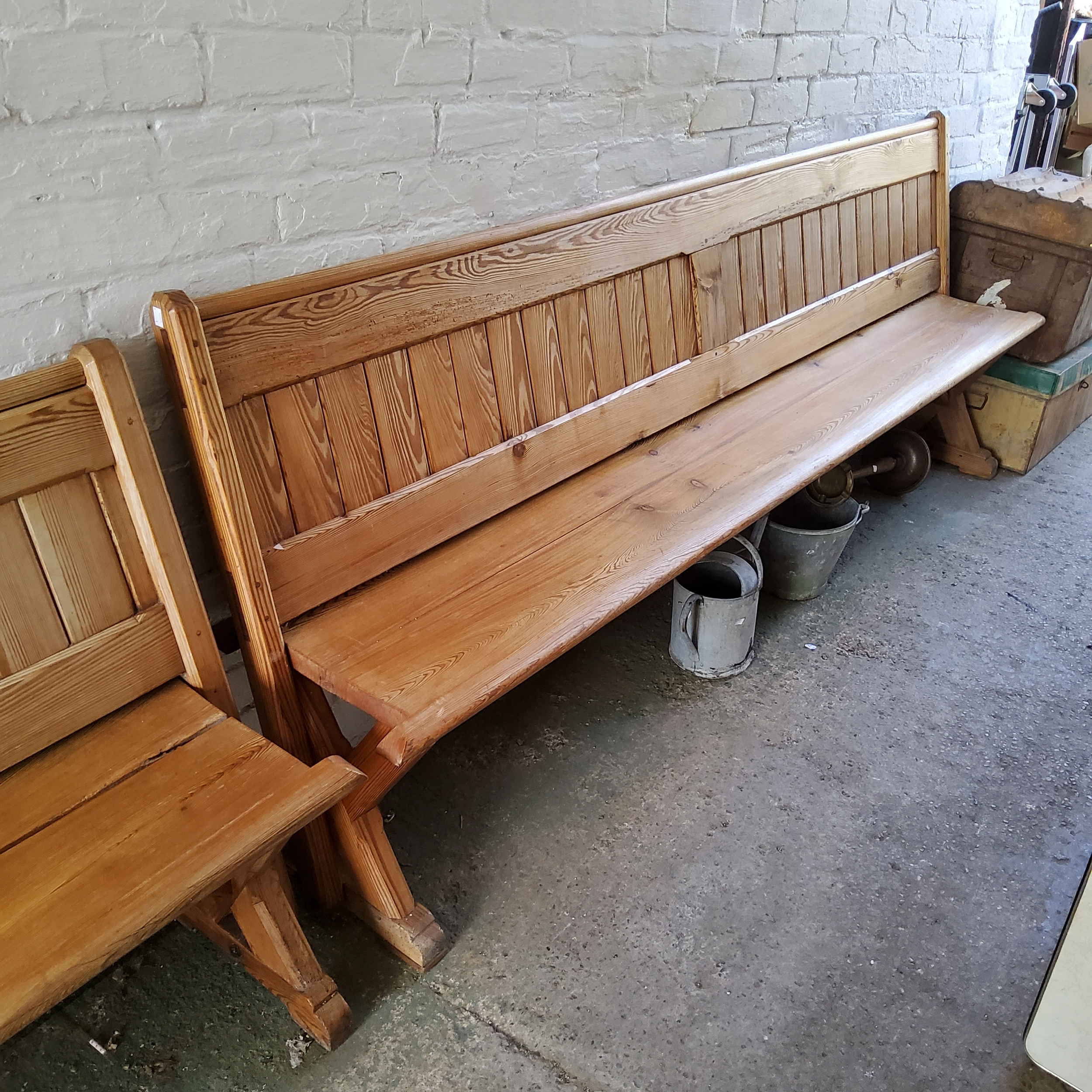 A Victorian pitch pine church pew/ tram seat, reversible slatted back, 240cm long, c,1860.  Note: - Image 4 of 4