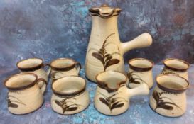 A post-war St Ives studio pottery part coffee set, comprising coffee pot,  six cups and a milk jug,