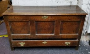 An early George III English oak blanket box, one long drawer to base, bold batwing brass escutcheons