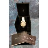 A Bulova Curv stainless steel watch, 262 khz quartz six jewel movement, rose gold plated bezel,