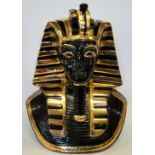 A large ceramic Tutankhamun pharaoh mask, moorish black and gold glaze, 34cm high