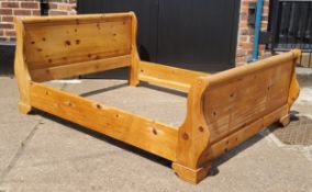 A Farmhouse pine double sleigh bed