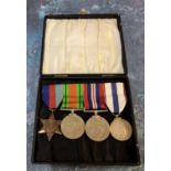 A WWII medal trio including George VI 1939-45 star, defence and service medal, unattributed, an