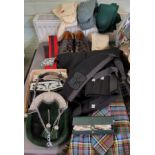 An Anderson tartan kilt, matching tie, kilt jacket, sporrans, belts, a pair of Ghillie brogues,