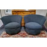 A pair of Art Deco shell back boudoir chairs, reupholstered in charcoal grey tufted fabric, c.
