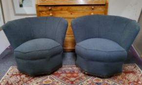 A pair of Art Deco shell back boudoir chairs, reupholstered in charcoal grey tufted fabric, c.