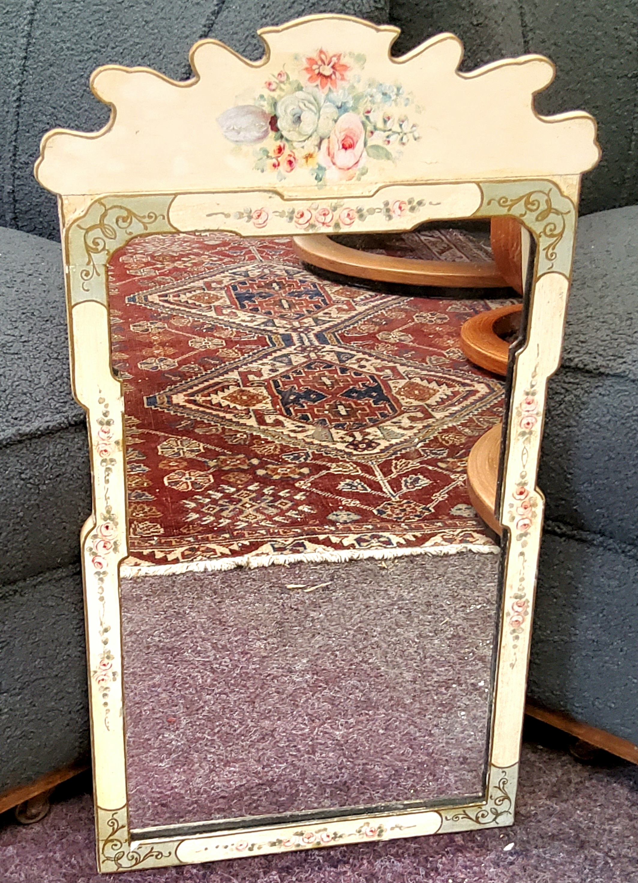 A George III style Vauxhall style mirror, painted with roses, white ground, 62cm high, 33cm wide,