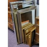 Various contemporary mirrors, the largest 77 x 106cms;  gilt picture/photograph frames,  the largest
