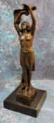 After Luis Noee, a bronze figure of an exotic maiden with hands aloft holding her hair, mounted on a