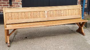 A Victorian pitch pine church pew / tram seat, slatted back, 240cm long, c,1860