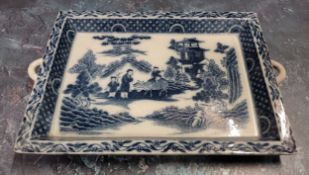 A 19th century Pearlware two handled Boy on an Ox pattern blue and white tray, 23.5cm wide, c.1820
