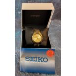 A Seiko 5 Automatic, 7526-0480 gold plated gentlemans watch, gold dial, white luminous baton markers