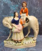 A scarce Victorian Staffordshrie figure group, First Ride, with young Scottish boy seated on a