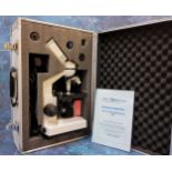 An Apex practitioner microscope LED complete with accessories in original fitted aluminium carry