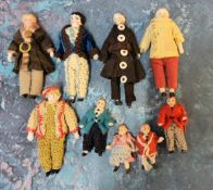 Nine German dolls' house dolls - all bisque and shoulder  head, croquet and felt clothes,  largest