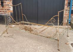 A 19th century French cast iron folding day bed, 92cm high, 190cm wide,  90cm deep, c.1870