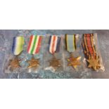 A collection of five WWII Second World War campaign medals including The Atlantic Star, The Italy