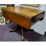 A 19th century mahogany Pembroke table, drawer to frieze, blind to verso, rounded rectangular top,