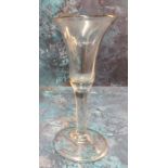 An 18th century English wine glass, flared bowl, clear stem, folded foot, 16cm high, c.1740