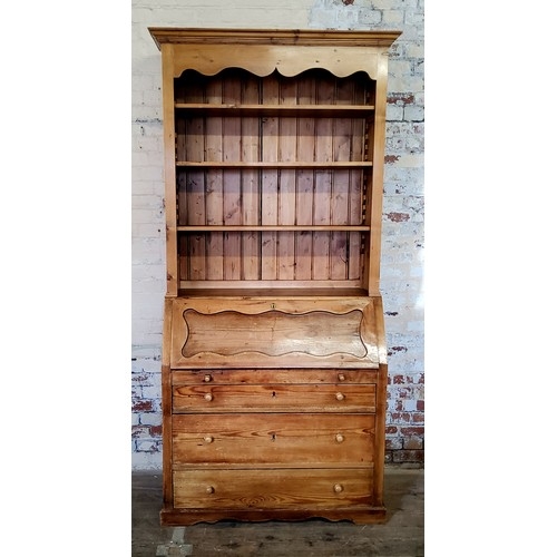 A 19th century English farmhouse pine bureau bookcase, fall front,  230cm high, 107cm deep, 50.5cm