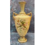 A Royal Worcester two handled pedestal ovoid vase, printed and painted with thistles on a blush