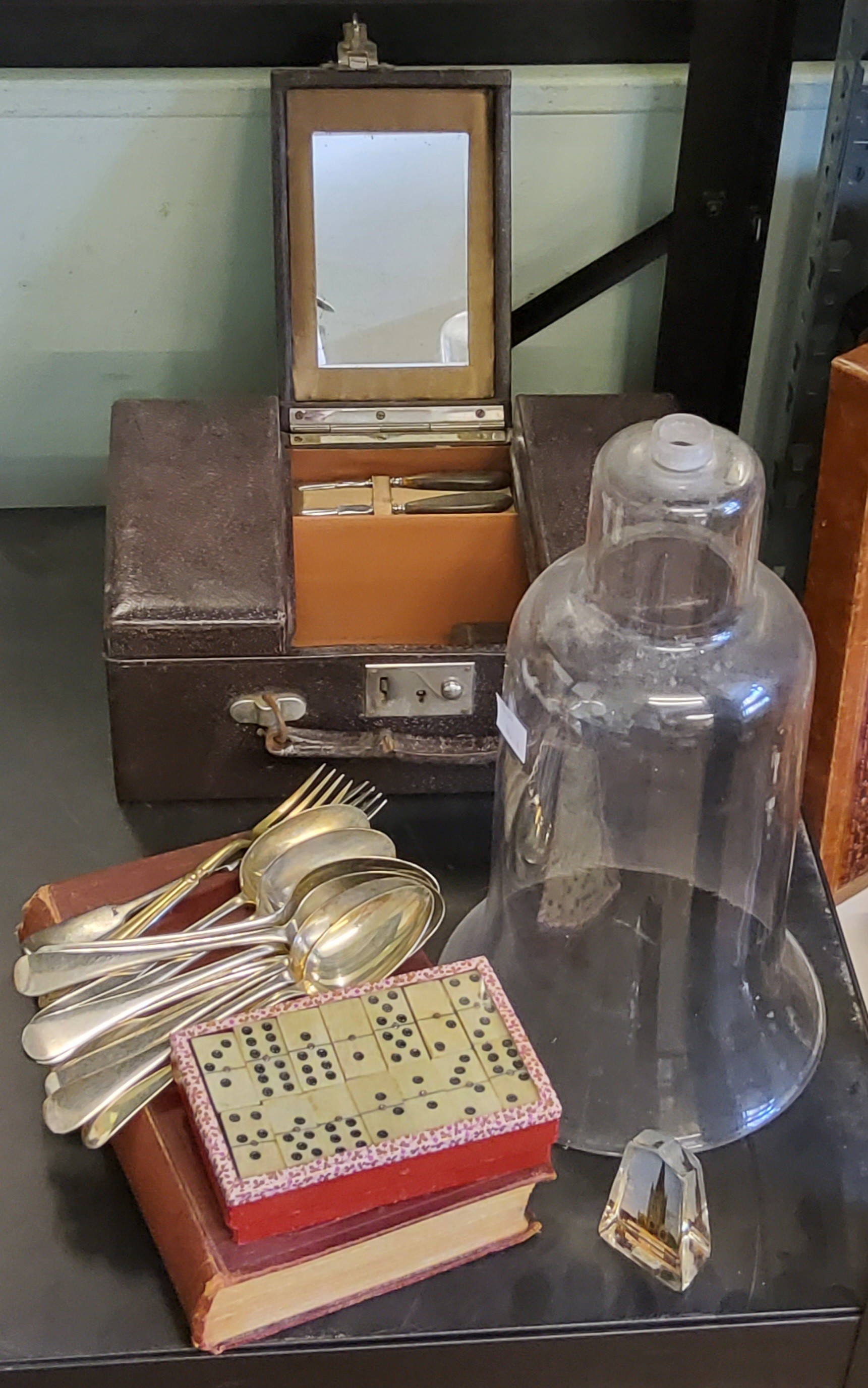 A gentleman's dressing case, fitted with mirror, Bakelite shaving brush case;  etc;  a set of bone