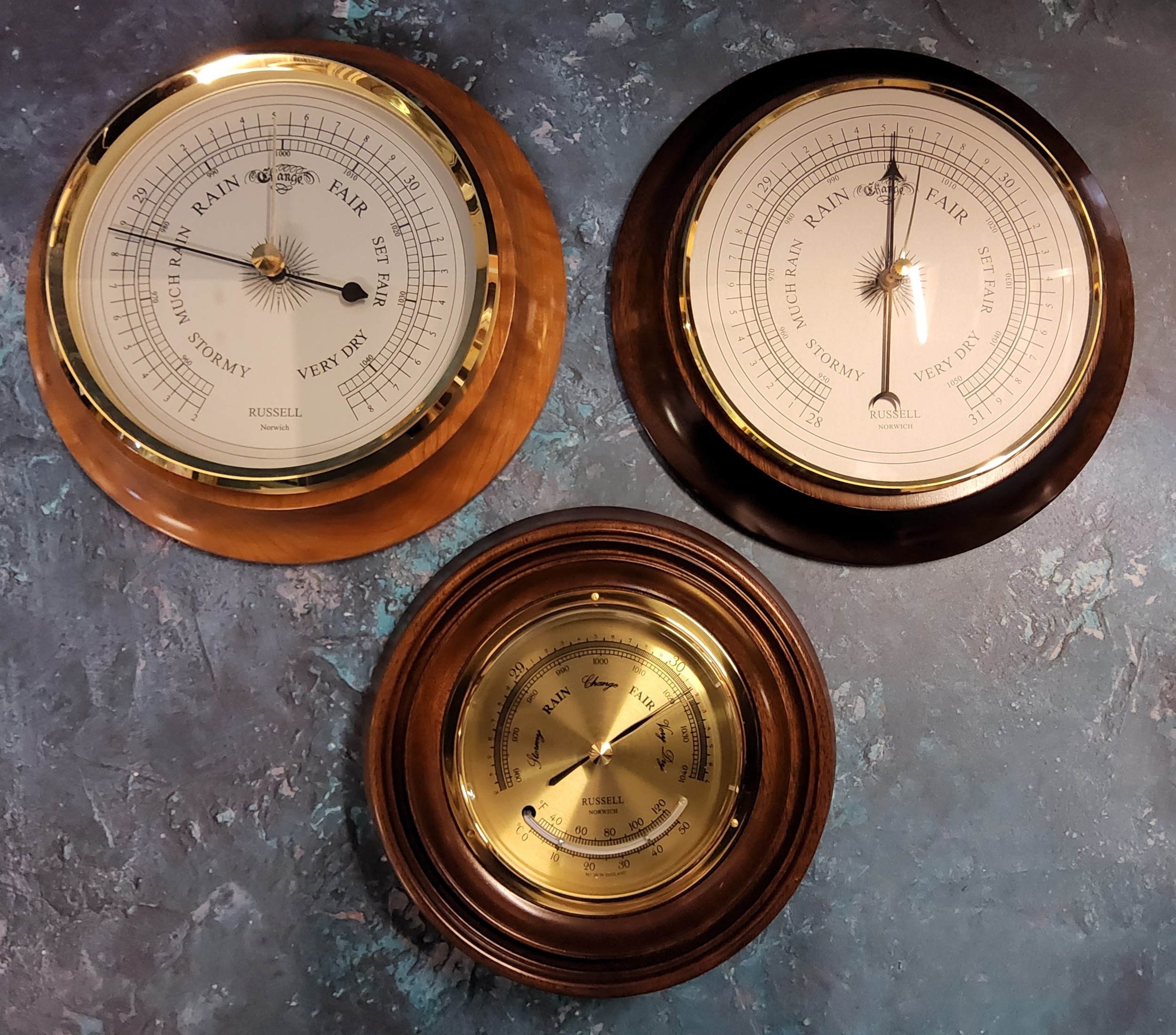 Three Russell of Norwich aneroid barometers the largest 20.5cms dia, NOS original packaging;  A