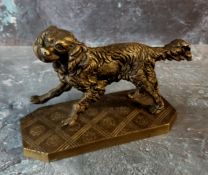 French School, early 20th century, gilt bronze, model of a Spaniel, canted square base, 8.5cm
