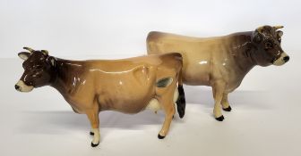 A Beswick Jersey bull, CH Dunsley Coyboy, printed marl; a Jersey cow, CH Newton Tinkle (2)