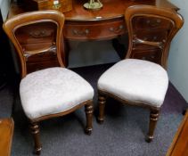A pair of Victorian mahogany balloon back chairs, stuffed over seats, turned forelegs, c.1860