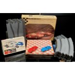 A Revell Home Racing set complete with a Ferrari 250 GTO, red, another blue, track, fencing,
