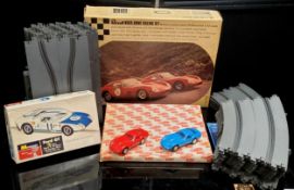 A Revell Home Racing set complete with a Ferrari 250 GTO, red, another blue, track, fencing,
