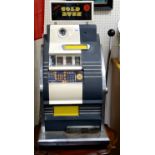 A vintage 1960's Mills ' Gold Rush ' one arm bandit arcade machine