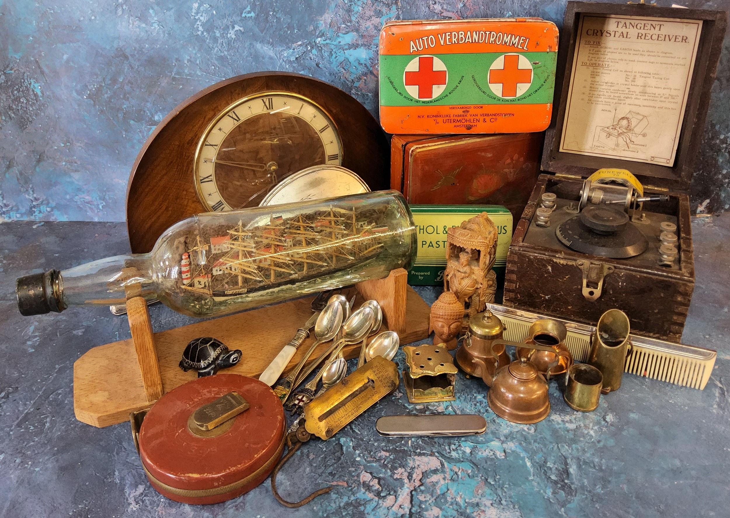 A Tangent Crystal Receiver, boxed;  a walnut mantel clock, c.1950;  ship in a bottle;  mid 20th