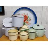 Metalware - various enamel canisters, sauce pans and a large charger painted with flowers