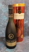 A bottle of Remy Martin Fine Champagne Cognac V.S.O.P. 70cl, unopened,in original cylindrical tube