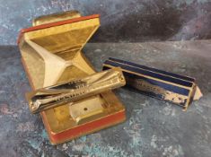 Advertisement - a vintage Hohner Examina I Harmonica tester, bellows operated; a boxed Hohner