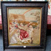 A Victorian woolwork tapestry, Noah Giving Thanks, 66cm x 57cm, carved oak frame