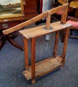 An unusual Scandinavian pine freestanding lever action cheese press