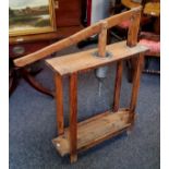 An unusual Scandinavian pine freestanding lever action cheese press