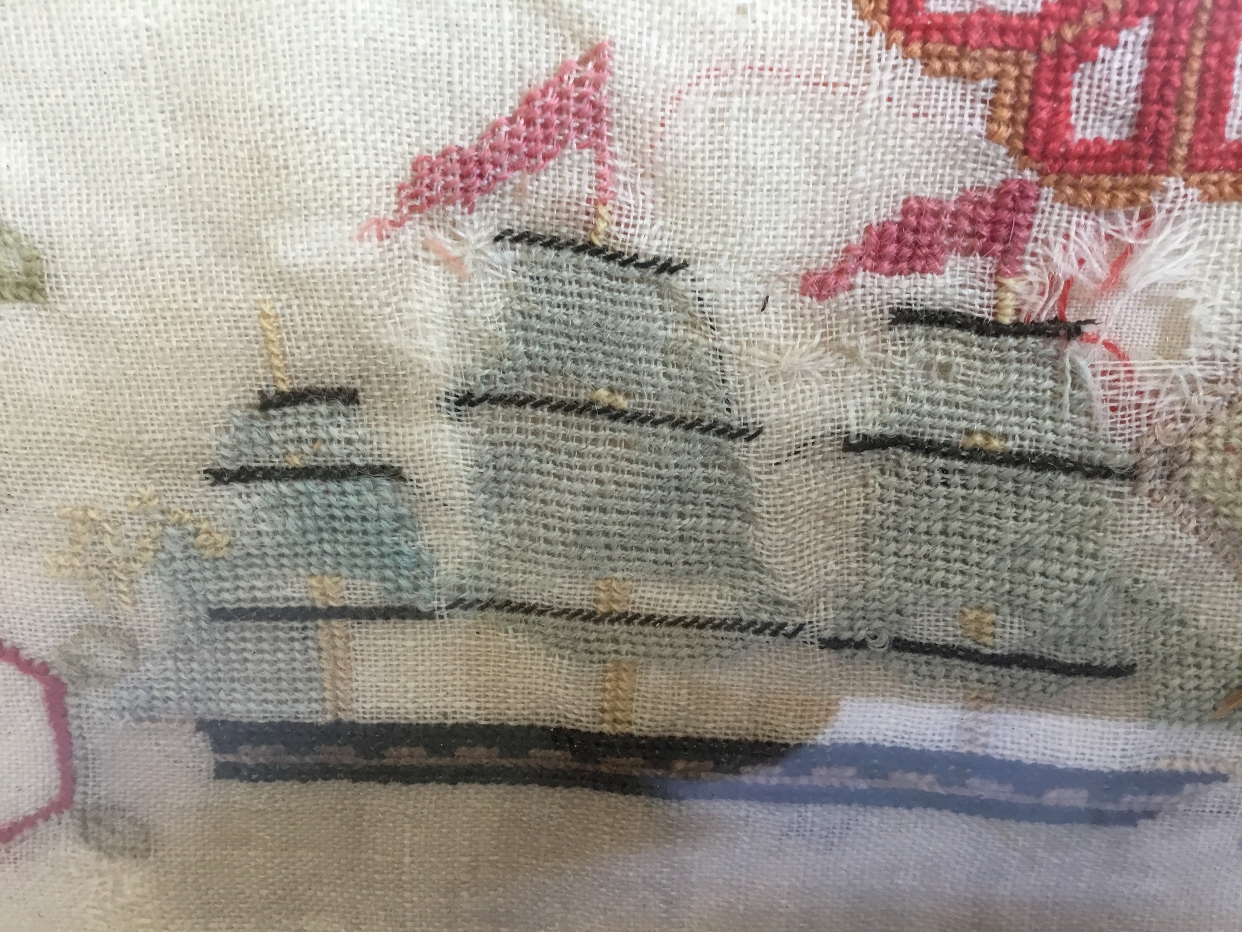 A Victorian Marine needlework sampler, embroidered with 3 masted ship, stylised flowers and - Image 2 of 3