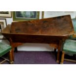 An early 19th century elm and fruitwood dough bin, rounded rectangular top, chipped carved edges,